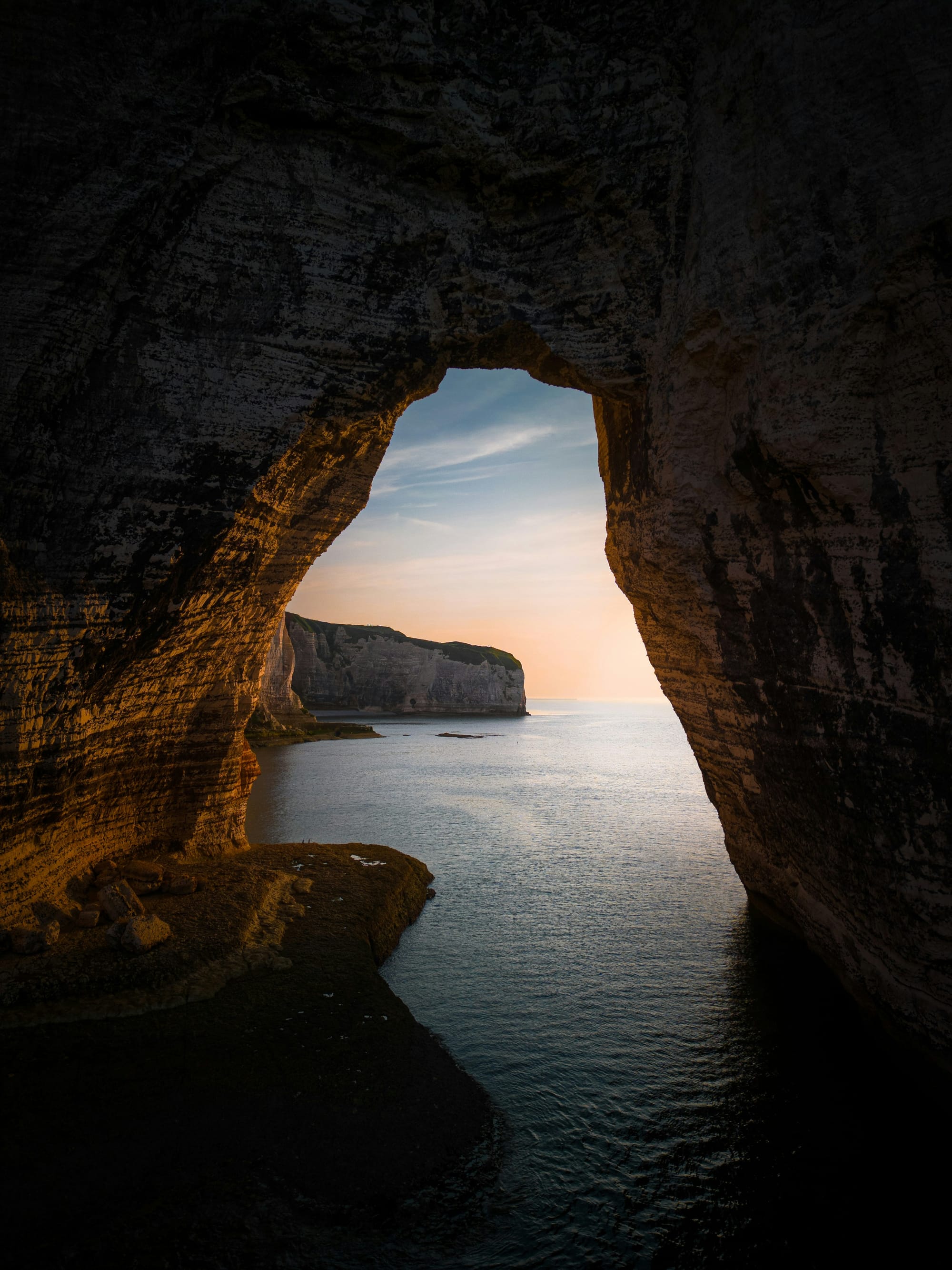 Sea cave overlooking the Atlantic at sunset